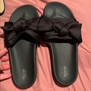 Black bow tie slides.